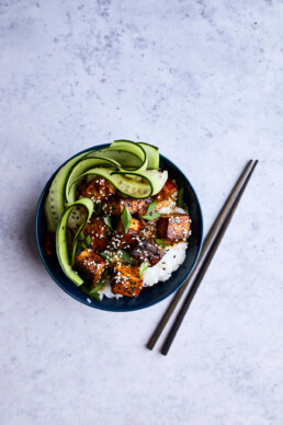 Stri fried tofu with rice and fresh cucumber